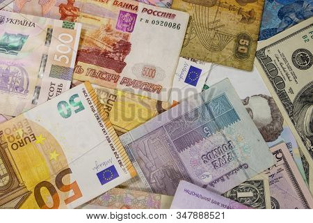 Multicurrency Background Of Euros Us Dollars, Russian Rubles, Egyptian Pounds And Ukrainian Hryvnias