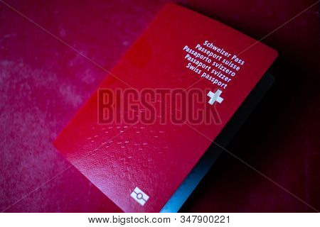  swiss passport on red background