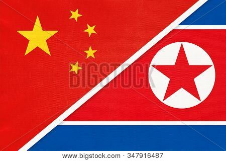 People's Republic Of China Or Prc Vs North Korea National Flag From Textile. Relationship Between Tw