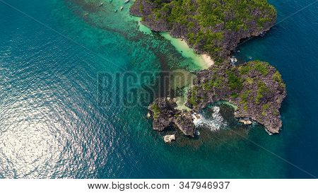Tropical Landscape: Lahos Island With Beautiful Beach And Tourists By Turquoise Water View From Abov