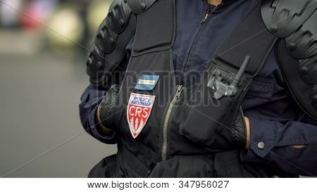 France Policeman Monitoring Public Order, Protecting Security In City Streets