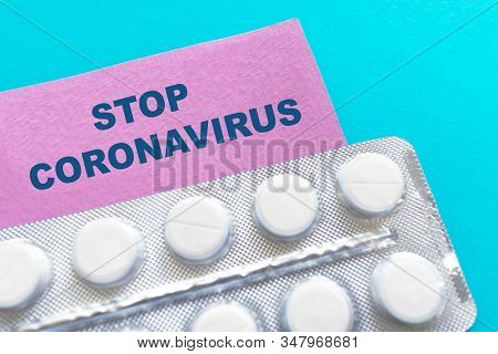 Text Stop Coronavirus  With White Pills, Blister, Tablets. Concept Of A New Chinese Coronavirus, Inf