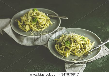 Spaghetti Pasta Bucatini With Pesto Sauce And Parmesan. Italian Traditional Perciatelli Pasta By Gen