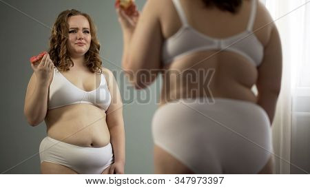 Depressed Woman Hating Her Fat Body, Eating Near Mirror, Lack Of Motivation