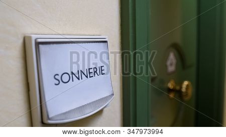 Sonnerie Word Written On Door Bell, Apartment Rental Service, Hospitality