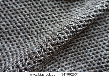 Diagonal Fold On Greyish Brown Woolen Fabric