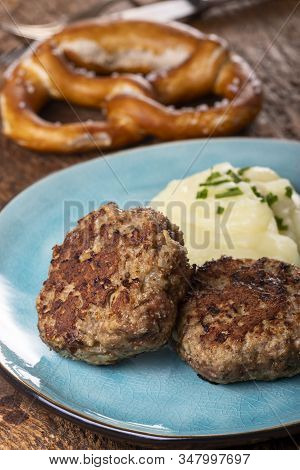 Two Bavarian Meat Loafs On A Plate