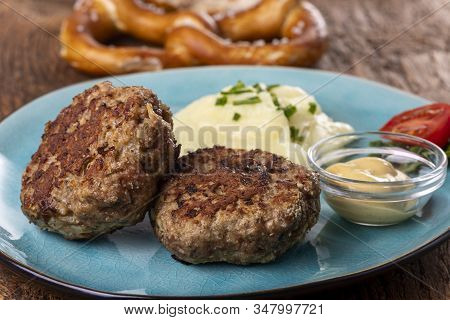 Two Bavarian Meat Loafs On A Plate