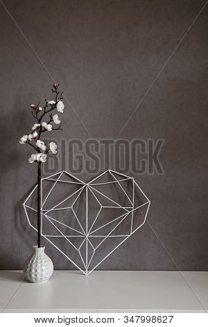 Stylish Still Life Inside Apartment. Elegant Heart With Notes On The Background Of Concrete Wall In 