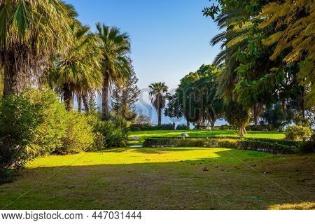 The Mount Bliss on the Sea of Galilee. Blooming park around the monastery. Catholic Church of the Beatitudes. Israel. The concept of religious pilgrimage and photo tourism