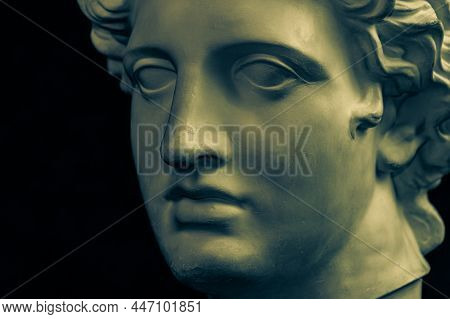 Bronze Color Gypsum Copy Of Ancient Statue Apollo God Of Sun And Poetry Head For Artists On Dark Bac