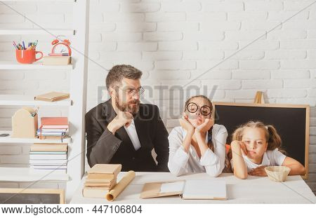 Little School Girl And Fether Teacher With Hold A Books With School Bag Is Back To School, Empty Spa