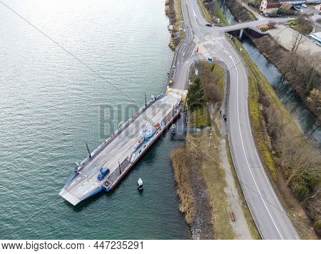 Ferry Rhinau-Kappel, Baden Wuerttemberg, France - January 23, 2022: Rhine ferry Rhenanus at Rhinau-Kappel between France and Germany. The ferry docked on the French side.
