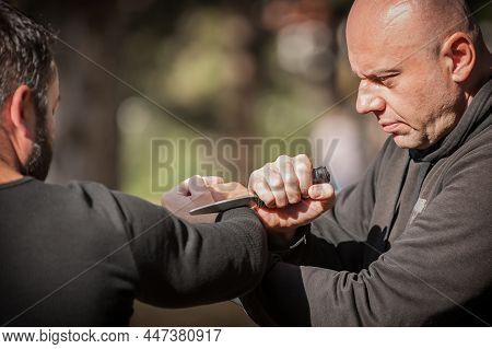 Knife Vs Knife Fight. Kapap Instructors Demonstrates Sombrada Drill Training