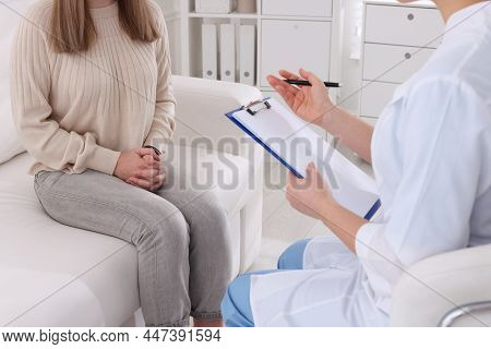 Young Woman Having Appointment With Std Specialist In Clinic, Closeup