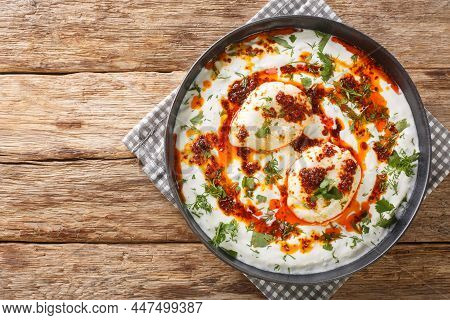 Cilbir Is A Turkish Eggs Containing Garlicky Yogurt, Poached Eggs, And Spiced Melted Butter In The P