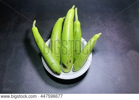 Bottle Gourd, Lagenaria Siceraria Isolated On Black Background.