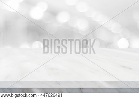 Empty White Table Top, Counter, Desk Over Blur Perspective Store With Bokeh Light Background, White 