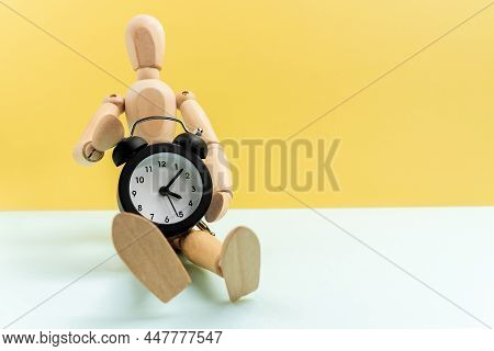 Wooden Man Alarm Clock. The Concept Of Transience Of Life. Lost Time Concept. With Space For Text