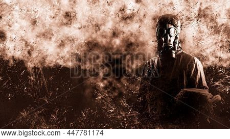 Male Stalker Holds A Medical Mask Against The Coronavirus In His Hand. He Is Dressed In A Protective