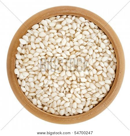Arborio Grain Rice in wooden bowl top view surface  isolated on white background