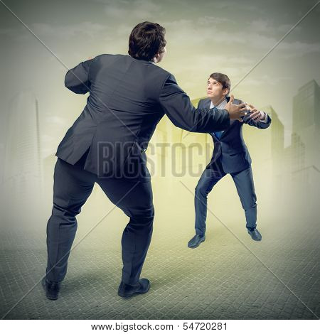 two businessmen fighting as sumoist