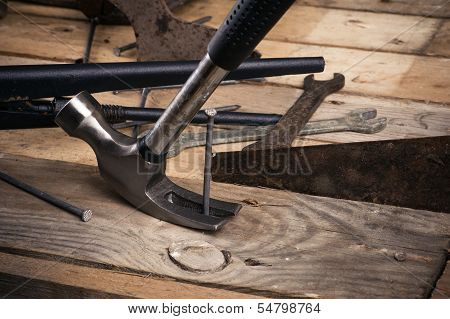 claw hammer on a workbench