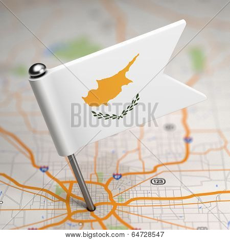 Cyprus Small Flag on a Map Background.
