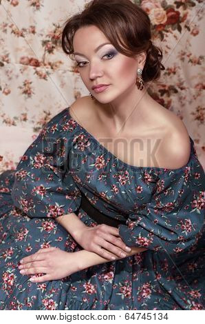 Beautiful young woman in fashion clothes