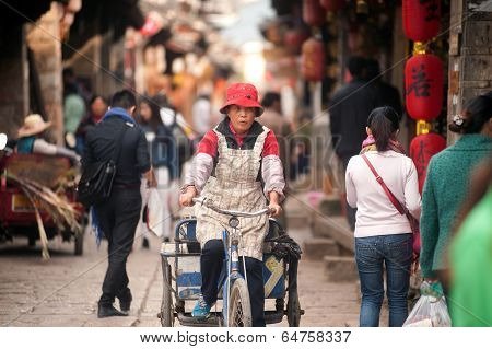 Crowd Walking In Shuhe Ancient Town.