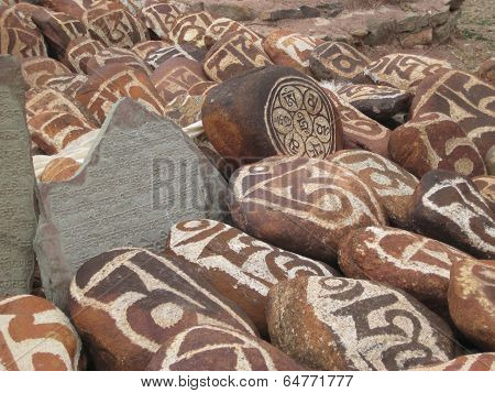 stone carved with symbols of prosperity