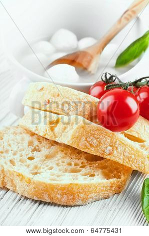 Mozzarella tomatoes and bread. Italian food