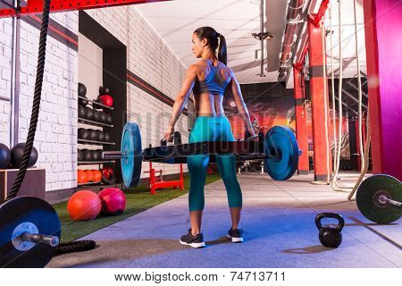 Hex Dead Lift Shrug Bar Deadlifts woman at gym workout weightlifting