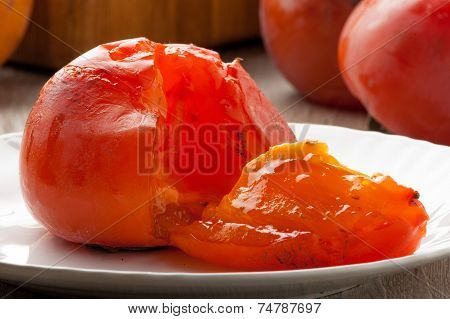 ripe persimmons served raw on the table ready to eat