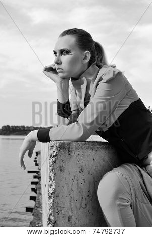 portrait photo of posing model girl looking far in black and white monochrome