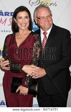 LOS ANGELES - FEB 22:  Mimi Rogers, Bill Smitrovich at the Night of 100 Stars Oscar Viewing Party at the Beverly Hilton Hotel on February 22, 2015 in Beverly Hills, CA