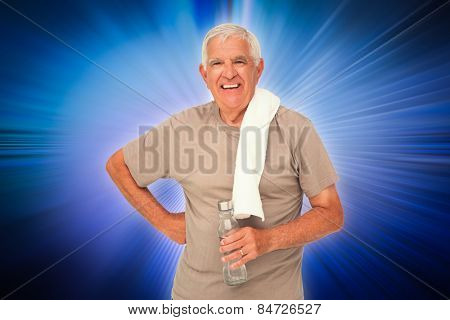 Portrait of a senior man with water bottle against abstract background