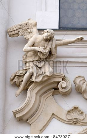 GRAZ, AUSTRIA - JANUARY 10, 2015: Angel on the portal of Mariahilf church in Graz, Styria, Austria on January 10, 2015.