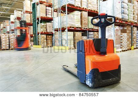 Manual forklift pallet stacker truck equipment at warehouse