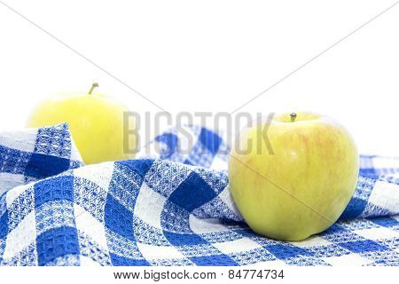 Fresh Yellow Apple Healthy Fruit On Blue Tablemat