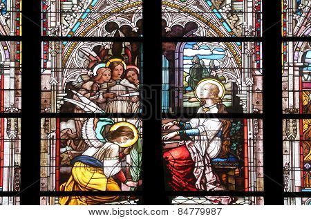 VIENNA, AUSTRIA - OCTOBER 11: Saint Cecilia, stained glass in Minoriten kirche in Vienna, Austria on October 11, 2014.