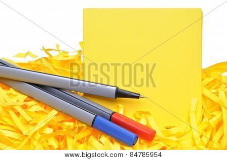 Markers with yellow sticky notes