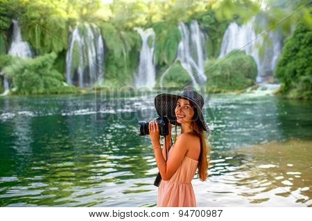 Woman tourist near Kravica waterfall