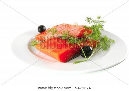 Rose saumon sur une plaque blanche aux Olives