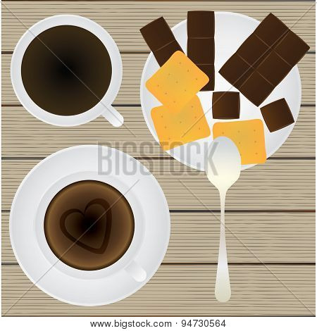 Cup Of Coffee, Saucer, Teaspoon, Chocolate And Cookies On A Table. Top View.