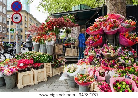 Rotterdam, Netherlands - May 9, 2015: People At Flower Shop In Rotterdam