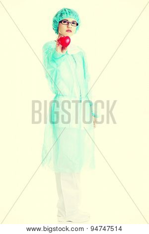 Young female doctor holding a toy againt stress