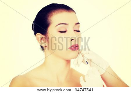 Cosmetic botox injection in the female face