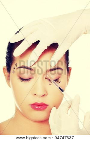 Cosmetic botox injection in the female face