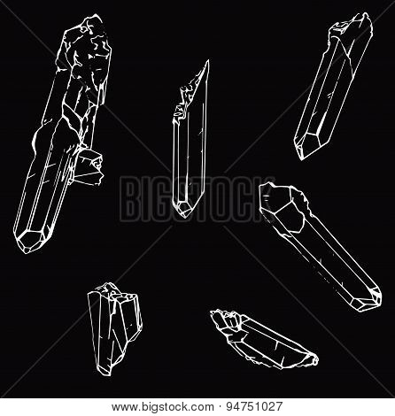 Set Of Six White Crystals In Black Background